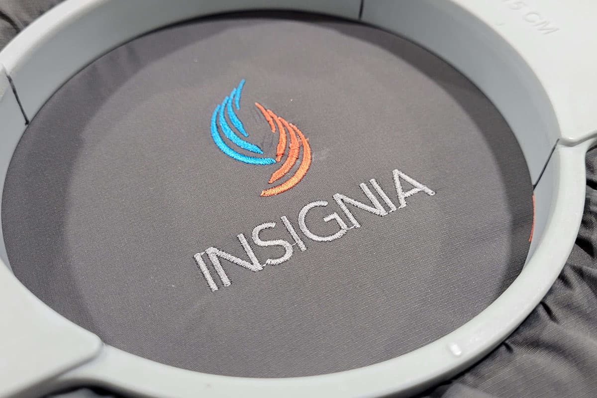 Logo being embroidered