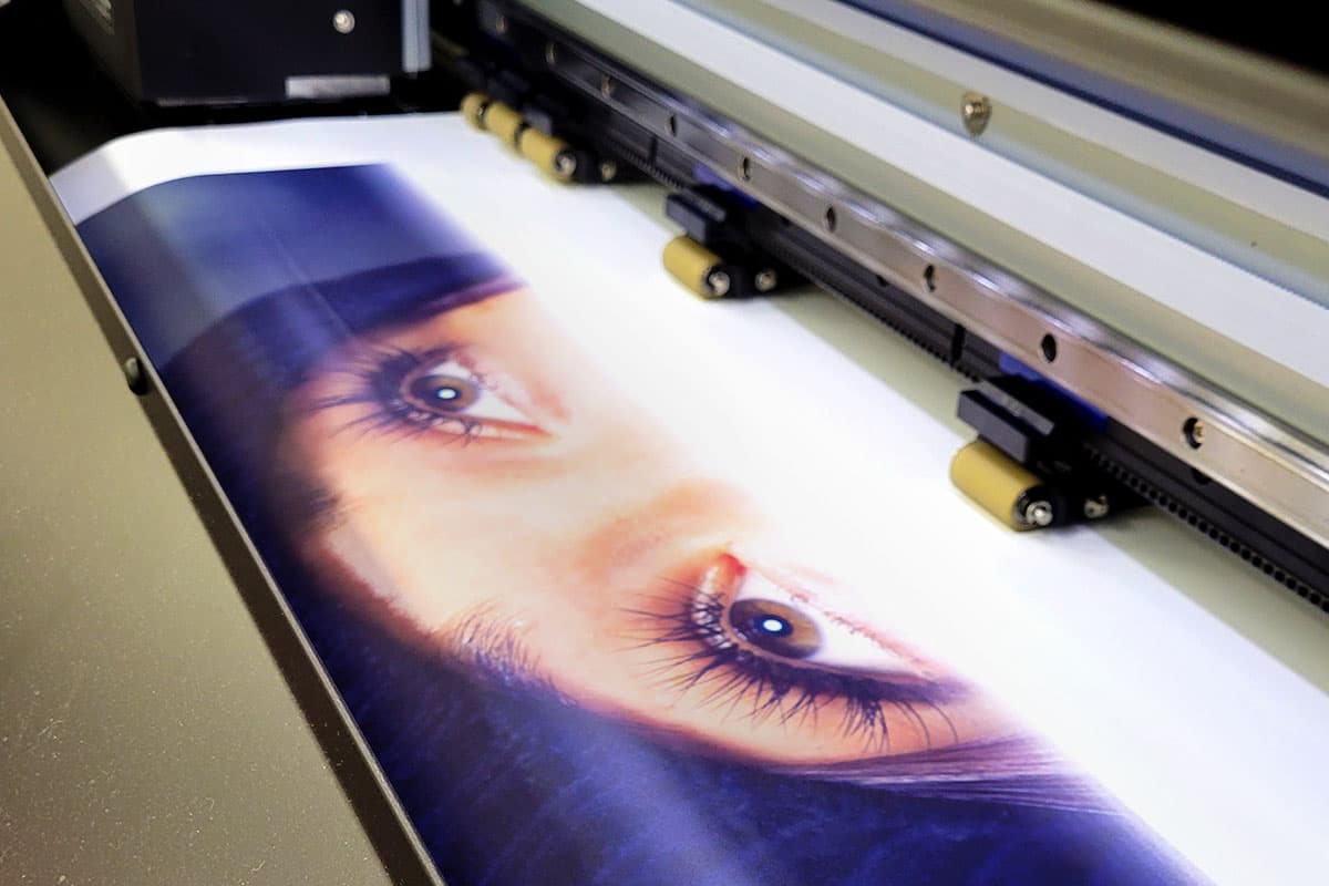 Large format printer printing a full-colour poster